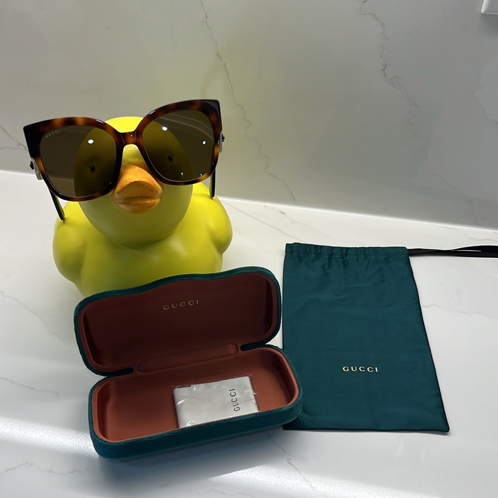 Gucci Sunglasses new with case, dust bag, and dust cloth.